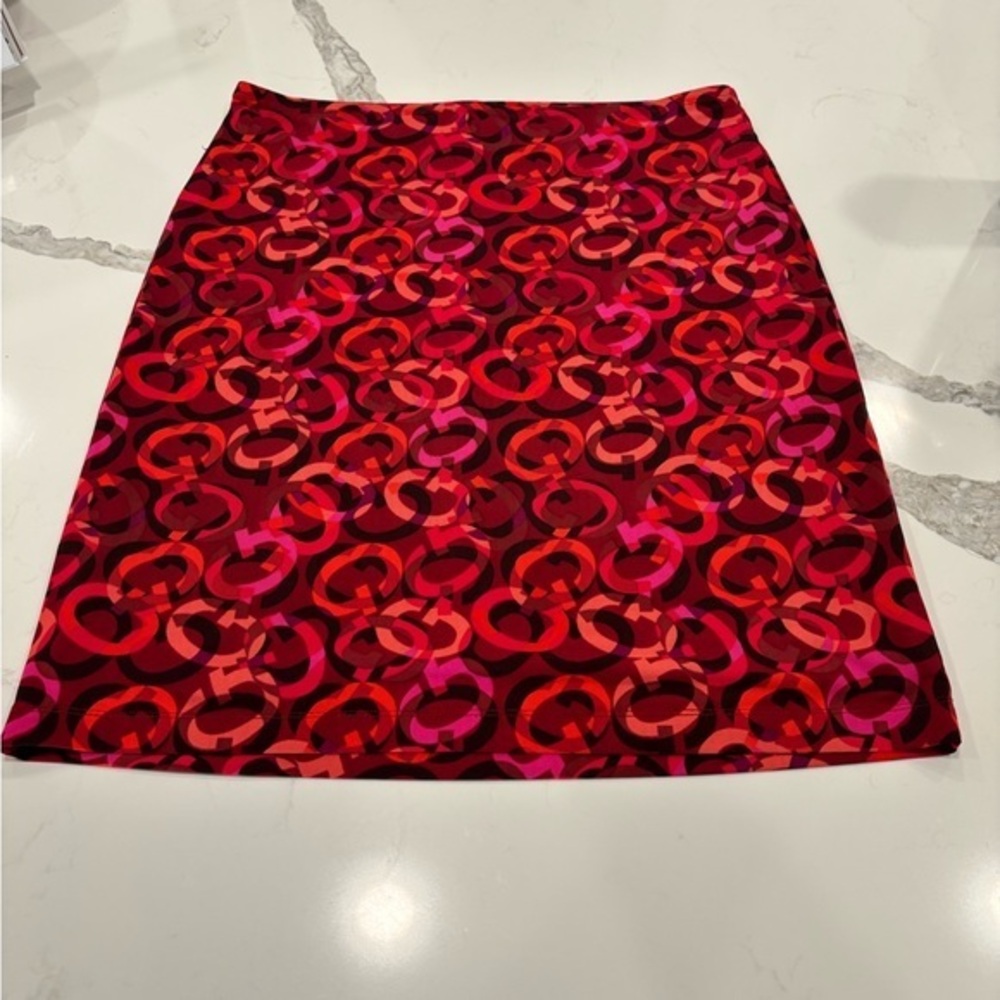 Guess red Women’s lined multicolor size medium skirt above the knee. Super cute.